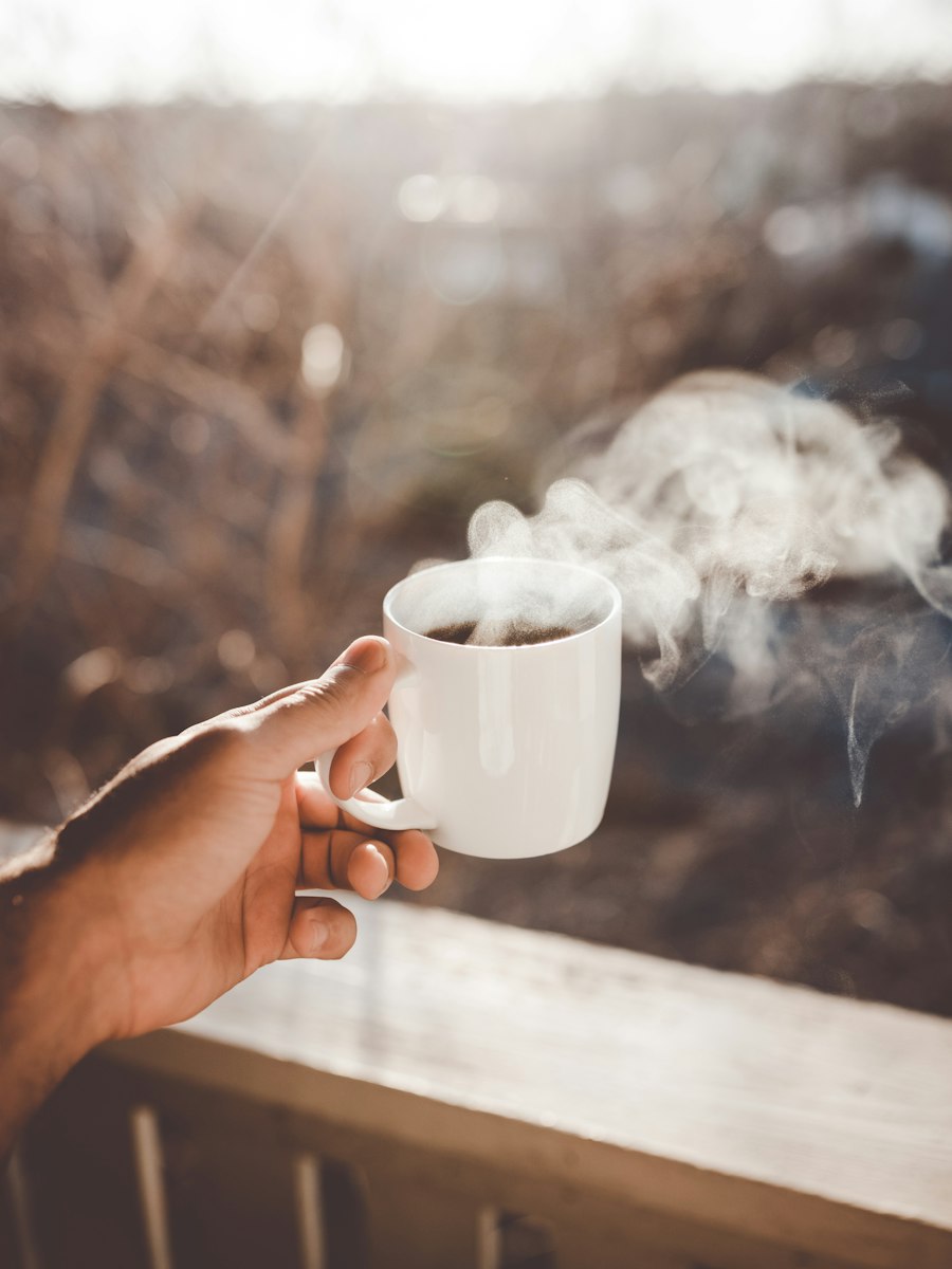 A freshly brewed cup steaming in the morning light